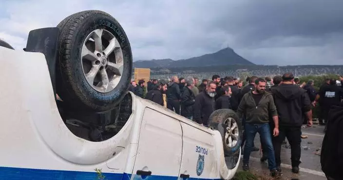 Protesting Greek farmers swarm onto apron area of international airport on Crete