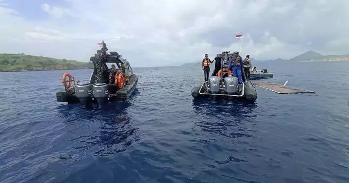 Indonesian rescuers search for a Spanish coach and 3 children after tour boat sinks