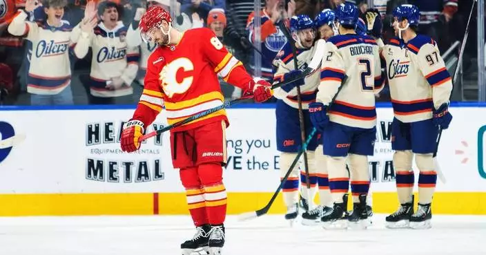 McDavid has 5 assists and Draisaitl scores 3 goals as the surging Oilers defeat the Flames 5-1