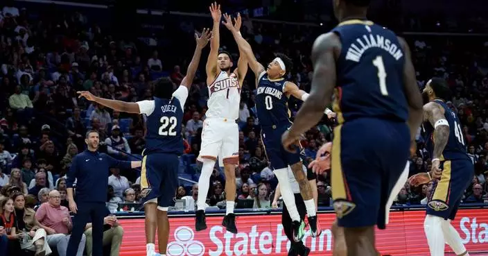 Booker leads Suns past Pelicans 123-114 after Alvarado and Williams exchange punches in testy game
