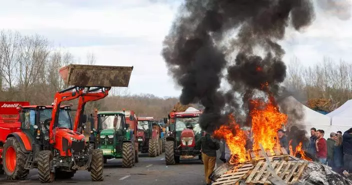 EU likely to delay free-trade deal with South America as French farmers block roads