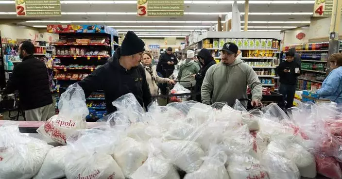 Families wait in line for hours to buy masa for Christmas tamales at beloved LA grocer