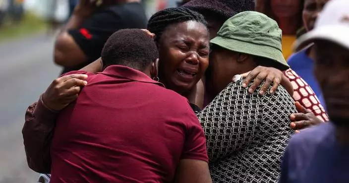 South African authorities revise death toll in school bus crash to 12 as driver is arrested