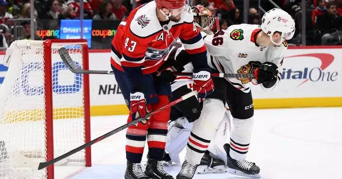 Capitals, Team Canada forward Tom Wilson leaves game with an apparent leg injury