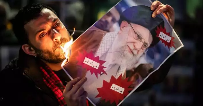 She set a photo afire, lit a cigarette — and became a symbol of resistance for Iran protesters