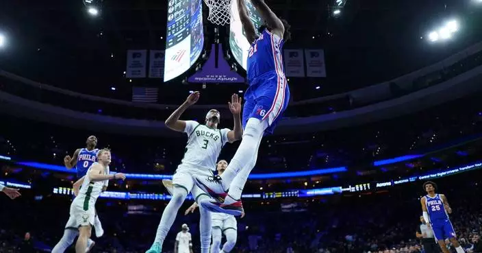 George scores 32 and Embiid has 29 to lead 76ers past short-handed Bucks 139-122