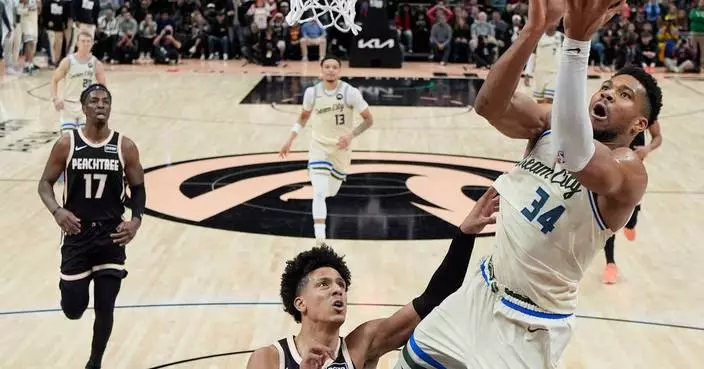 Antetokounmpo and the Bucks hold off Atlanta 112-110 to snap a three-game skid