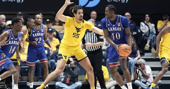 Honor Huff and Brenen Lorient help West Virginia beat No. 22 Kansas 86-75