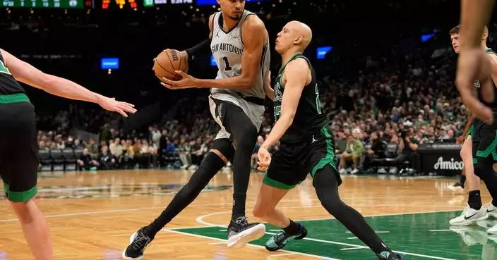 Wembanyama and Fox each score 21 points in Spurs' 100-95 win over Celtics
