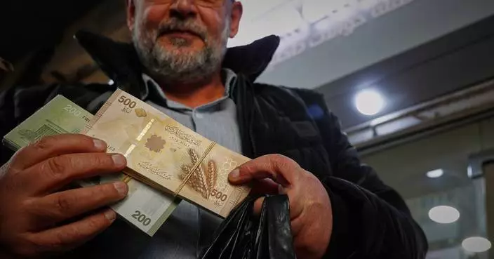 Syria begins circulating new post-Assad currency bills