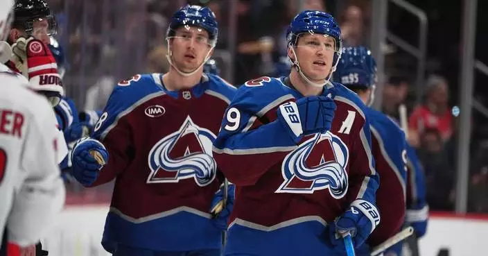 MacKinnon has 2 goals and an assist to reach 1,100 points, Avs beat Capitals 5-2