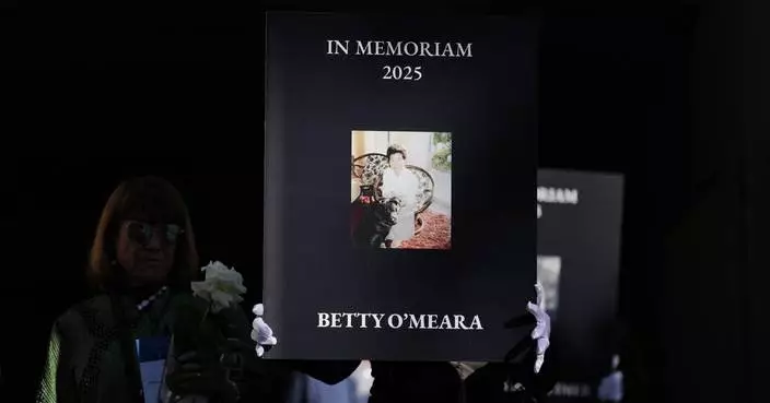 Mourners mark a year since Los Angeles wildfires, in photos