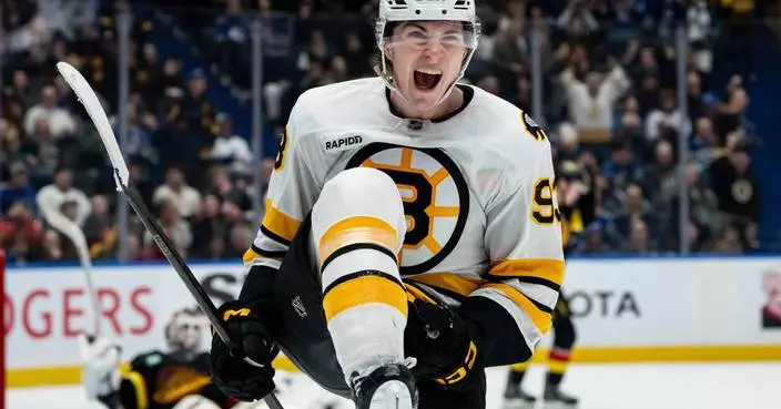 Minten scores twice in huge homecoming to lift Bruins over Canucks 3-2 in OT