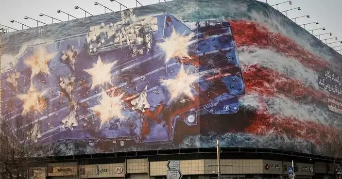 Iran unveils mural warning of retaliation if US conducts a military strike