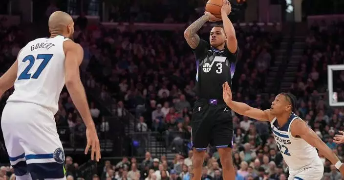 George scores 43 as Jazz rallies to beat Timberwolves 127-122, giving Hardy his 100th coaching win