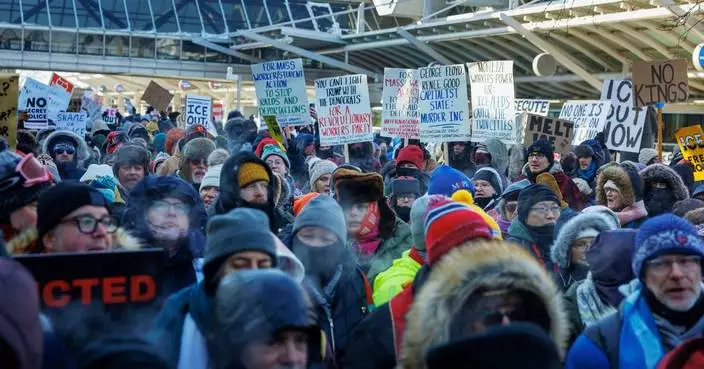 Police chief calls for calm after a man is shot and killed during Minneapolis immigration crackdown