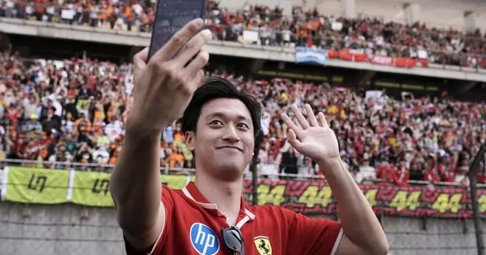 Cadillac hires Zhou Guanyu as reserve driver for its debut F1 season