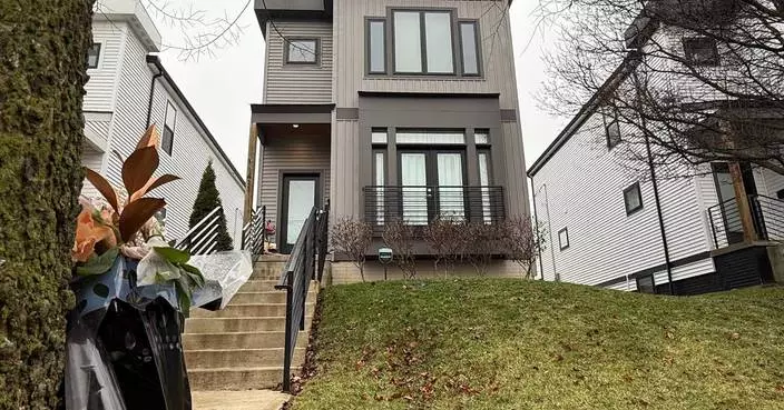 Police release footage of a person of interest in the killing of an Ohio couple