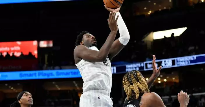 Cedric Coward hits 2 late 3s to help the  Grizzlies beat the Nets 103-98