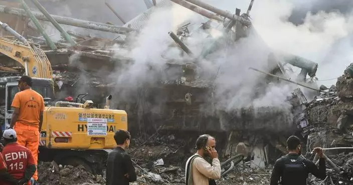 Rescuers race to recover bodies after massive Karachi shopping plaza fire, in photos