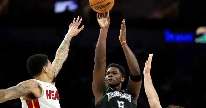 Edwards has 26 points to help Wolves beat Heat 122-94