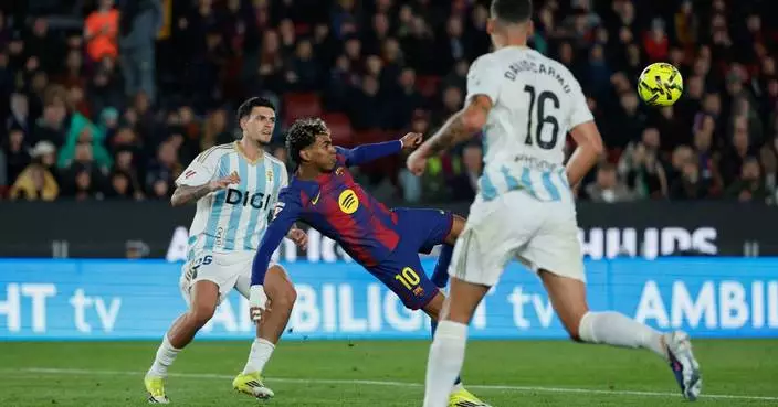 Yamal’s acrobatic goal helps Barcelona beat Oviedo and regain Spanish league lead