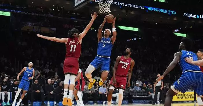 Paolo Banchero and Anthony Black lead Magic past Heat 133-124 to snap 4-game skid