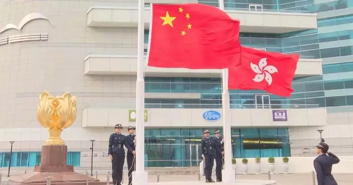 Hong Kong, Macao hold New Year flag-raising ceremonies