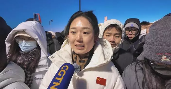 Proud citizens greet new year gather at China’s national flag-raising ceremony