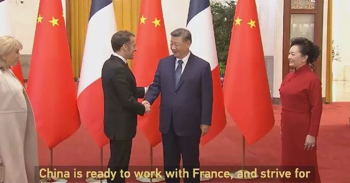 Xi, Macron vow to enhance bilateral ties