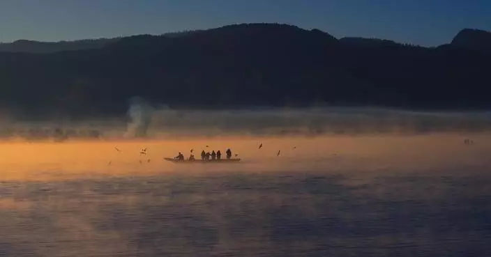 Lugu Lake offers enchanting winter scenery at sunrise