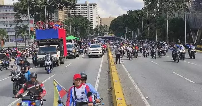 Bus, taxi, motorcycle drivers rally with vehicles in Caracas to demand Maduro release