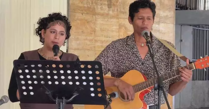 Venezuelan artists in Caracas call for peace with poetry, song