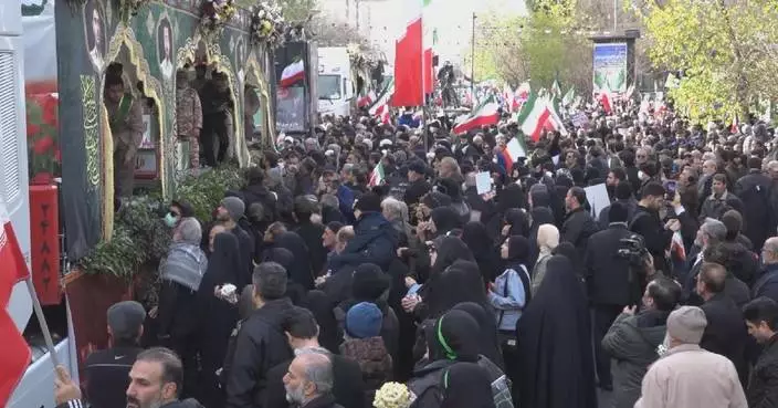 Iran holds funeral for unrest victims, rejects report of high death toll
