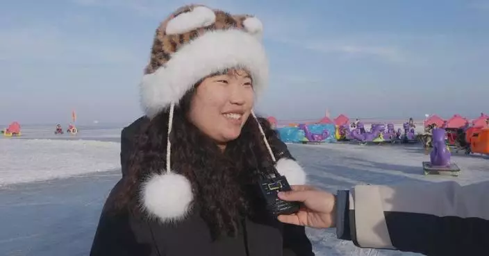 Xinjiang’s Bosten Lake turns into vast winter wonderland