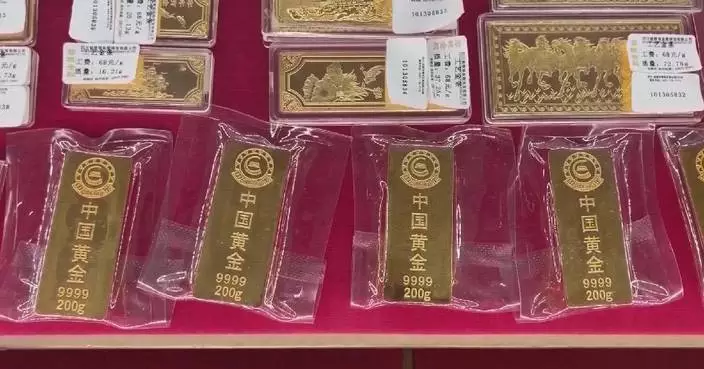 Gold price tops 5,200 US dollars