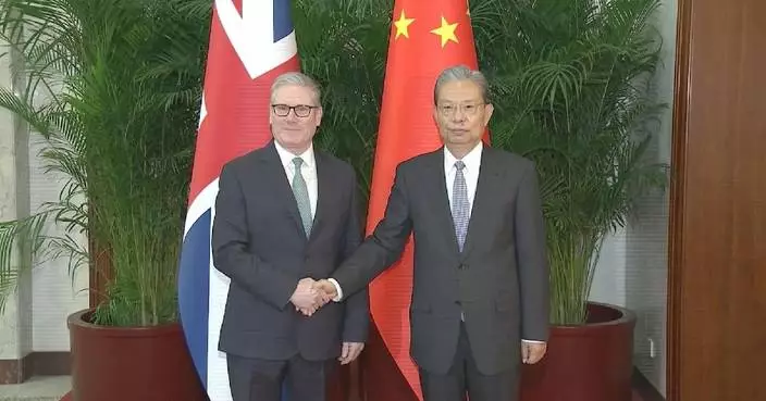 China’s top legislator meets British PM in Beijing