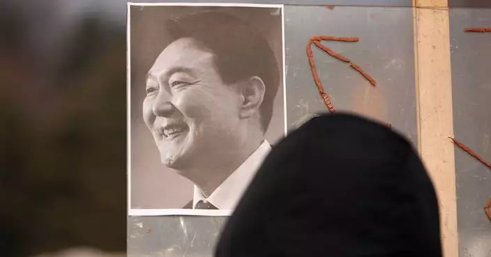 A South Korean court sentences Yoon to 5 years in prison on charges related to martial law decree