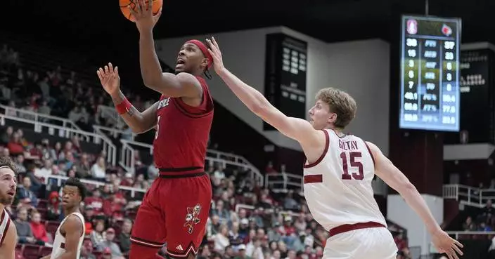 Freshman Ebuka Okorie leads Stanford to an 80-76 win over No. 16 Louisville