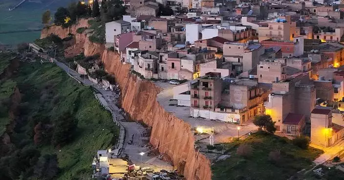 Huge landslide cleaves off the edge of a town in Sicily and forces the evacuation of 1,500 people