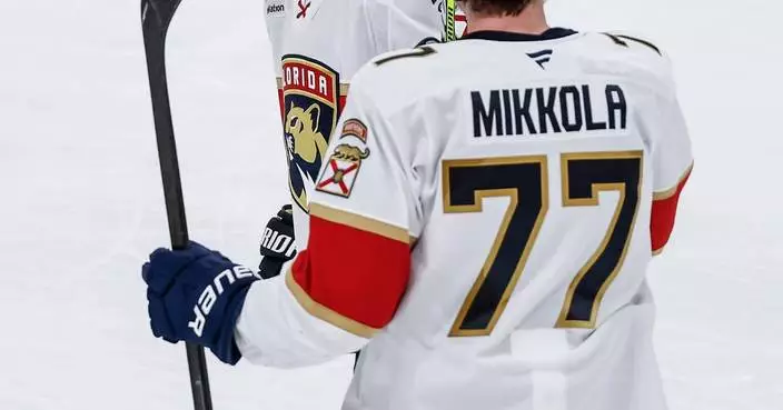 Journeyman Bjornfot has his first 2-goal game, Panthers score 4 times in 3rd to beat Blackhawks 5-1