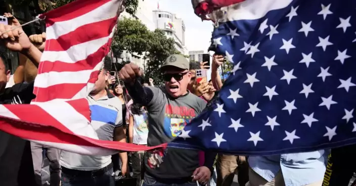 Photos show people reacting to the US capture of Venezuelan President Nicolas Maduro