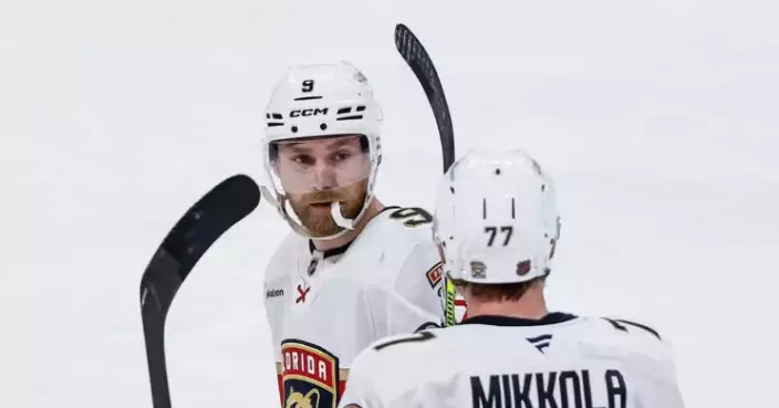 Journeyman Bjornfot has his first 2-goal game, Panthers score 4 times in 3rd to beat Blackhawks 5-1