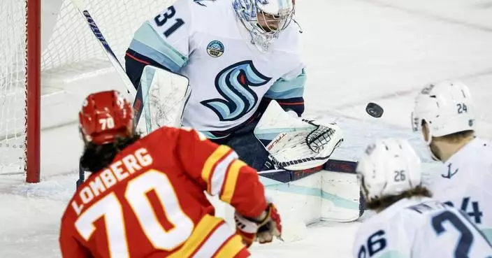 Red-hot Grubauer backstops streaking Kraken to 5-1 win over Flames