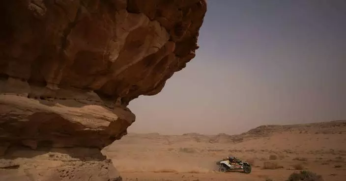 Dakar Rally moves through sweeping desert landscapes, in photos