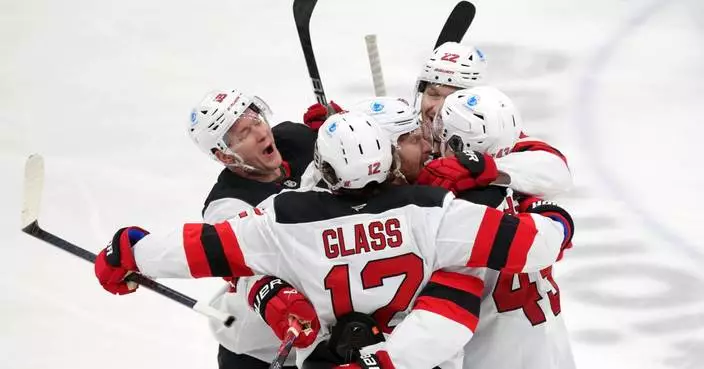 Luke Hughes breaks 3rd-period tie in the Devils' 3-2 victory over the Blue Jackets
