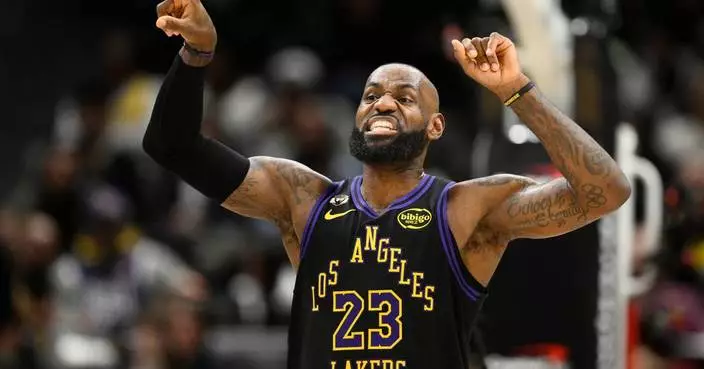 Doncic and James lead the way, and the Lakers shoot 61% from the field in a 142-111 rout of Wizards