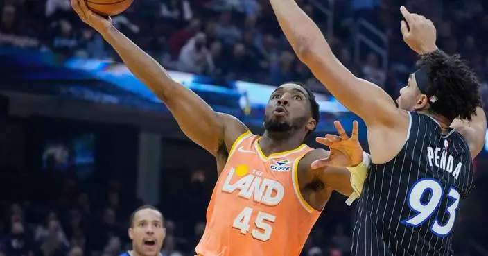 Mitchell scores 45 as Cavaliers beat Magic 114-98 for 4th straight win