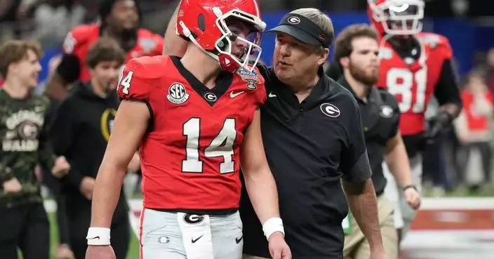 Georgia’s Smart gambles on fourth down with mixed results in a CFP loss to Ole Miss