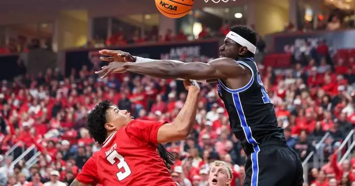 JT Toppin scores 27 points to lead No. 15 Texas Tech to an 84-71 victory over No. 11 BYU